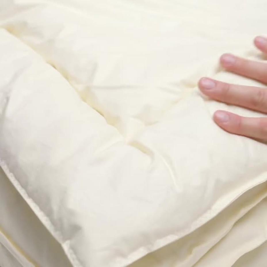 Nettoyage et entretien d'une couette en laine - Filature Long Maï
